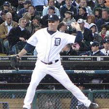 On field player making a play in the diamond.